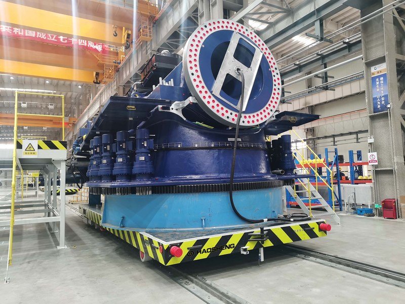 Custom RGV transferring a wind turbine nacelle between assembly stations