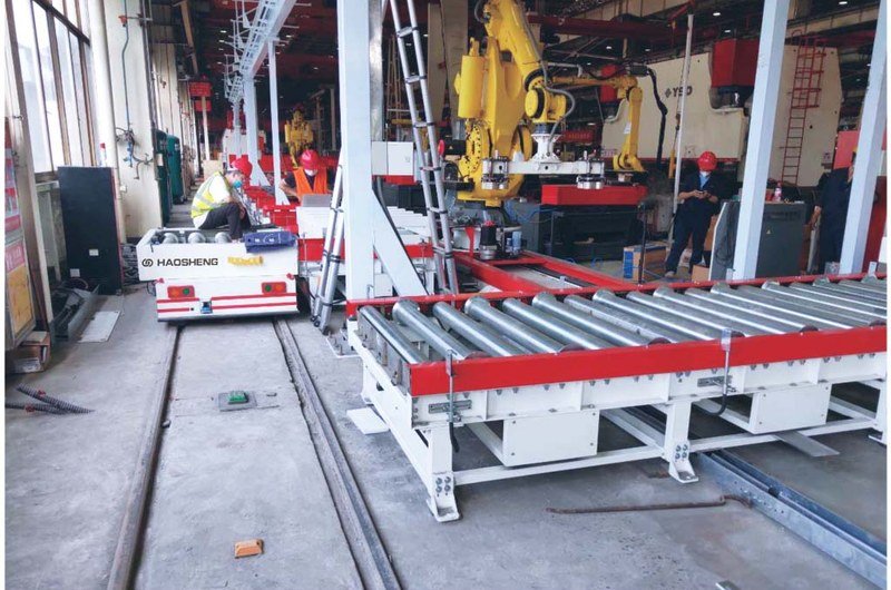 Roller-Deck AGVs and RGVs: Automating Line-to-Line Material Transfer