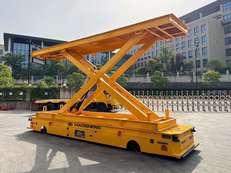 Custom scissor-lift AGV for height-matched station transfer