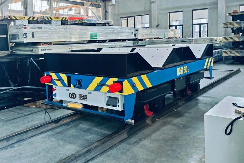 Custom V-deck RGV cradling cylindrical material